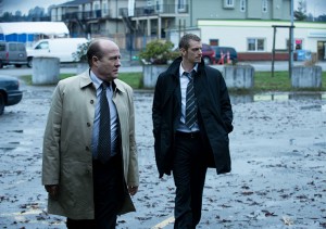 Greg Henry as Carl Reddick, Holder's (Joel Kinnaman) new partner.