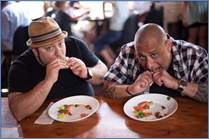 Frank Coraci (l.) and Sam DeMarco (r.) search for America’s tastiest and most creative comfort food in “Chow Masters”