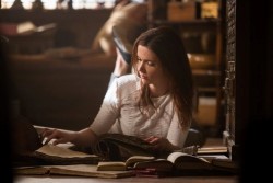 Juliette helps Nick go through journals to find clues to El Cucuy