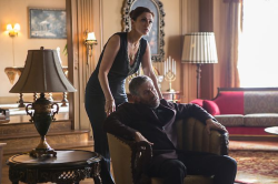 Boris (seated, Mark Ivanir) and his wife Olga (Aleksandra Karviak) seem innocent enough...but her jealousy will rear their ugly tusks soon enough.