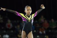 Sydney Mikayla as “Gabby Douglas”