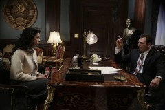 Arkady explains to Nina the importance of taking the polygraph test.