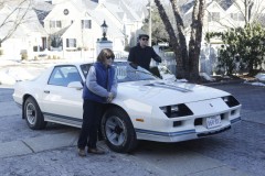 Henry and Philip proudly showing off the new car.