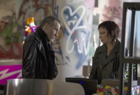 Chloe (Mary Lynn Rajskub) and Cross (Michael Wincott)