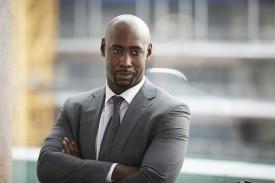 Is Malone (DB Woodside) an asset or liability to the firm?
