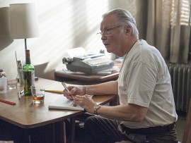 Mickey is working on the details for the robbery when Kate pays him a visit.