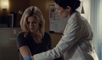 Charlotte seems taken aback when she first meets Audrey, as if she's seen a ghost. 