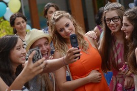 Everyone wants a selfie with Becca.