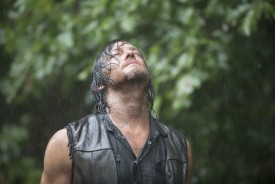 Daryl enjoying the rain shower. Too bad no one had a bar of soap.