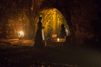 Vanessa strikes up a conversation with John Claire. 