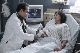 Tony Shalhoub as Dr. Bernard Prince and Purva Bedi as Tazim in Nurse Jackie (Season 7, Episode 11). - Photo: David M. Russell/SHOWTIME - Photo ID: nursejackie_711_0580.R