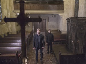 Ray meets up with Father Romero at church.