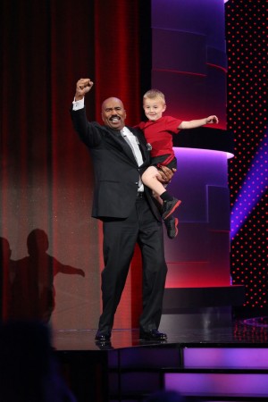 LITTLE BIG SHOTS -- Episode 101 -- Pictured: (l-r) Steve Harvey, Titus Ashby -- (Photo by: Danny Feld/NBC)