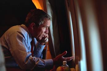 After departing Offutt Air Force Base in Nebraska, President George W. Bush confers with Vice President Dick Cheney from Air Force One Tuesday, Sept. 11, 2001, during the flight to Andrews Air Force Base - Photo: Eric Draper, Courtesy of the George W. Bush Presidential Library/Courtesy of Smithsonian Channel
