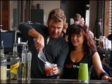 Host Jack Maxwell attempts to make the Whiskey Kiss at ViewHouse in Denver