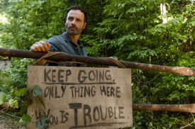 Rick is out scrounging for scraps while his son is taking a stand. How does that work?