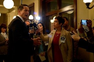 Renard...well, Nick as the Renard double, giving the press more controversial news about his decision to abdicate the mayorship.