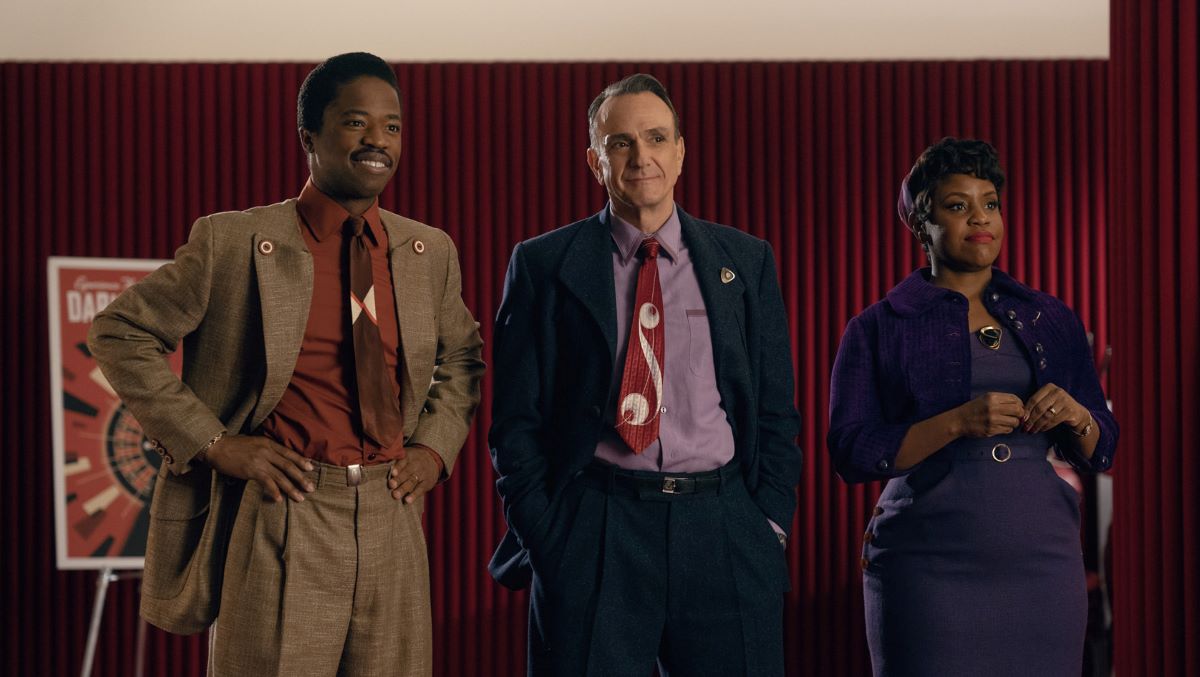Episode 1. Dewshane Williams, Hank Azaria and Haneefah Wood in "Hello Tomorrow!," premiering February 17, 2023 on Apple TV+.